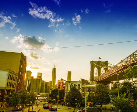 BROOKLYN, NEW YORK - JUNE 14, 2013: Tourists walk along city streets on a beautiful sunny day. More than 50 million people visit New York every year.のeditorial素材