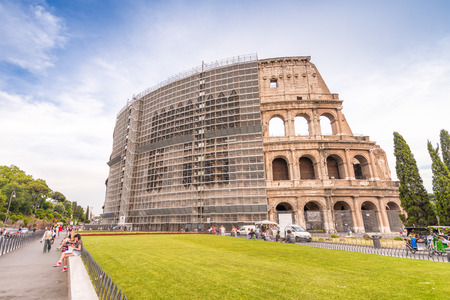 Facade of Colosseum in Rome with maintenance works.の写真素材