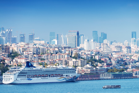 ISTANBUL - SEPTEMBER 16, 2014: Cruise ship anchored in city port. Istanbul is a favourite destination for cruise lines.のeditorial素材