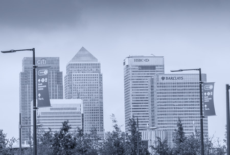 LONDON - SEPTEMBER  29, 2013: Canary Wharf aera and buildings. Canary Wharf is a large business and shopping district.のeditorial素材