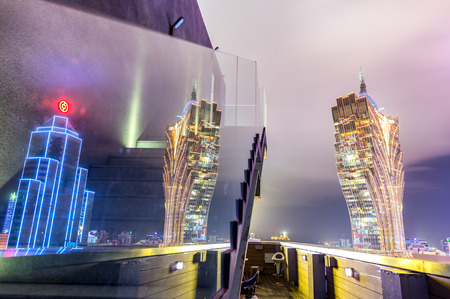 MACAU - APRIL 11, 2014: Macau night skyline. The city is a famous gambling destination in China.のeditorial素材