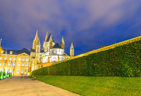 Caen. Normandy. Men Abbey exterior and gardens at night.の写真素材