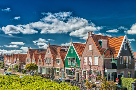 Volendam, Netherlands. Classic homes aligned along city street.の写真素材