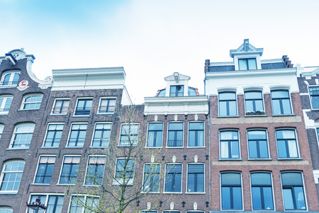 Beautiful view of Amsterdam with typical dutch houses. Holland.の写真素材