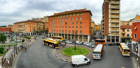 PISA, ITALY - MAY 6, 2015: Central Station Square with tourists. The city is visited by more than 3...