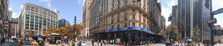 NEW YORK CITY - JUNE 14, 2013: Tourists and locals in Greeley Square Park. New York attracts 50...