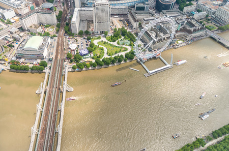 Helicopter view of London Panoramic Wheel and river Thames.の写真素材