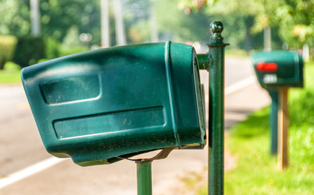 A row of mail boxes in a rural community.の写真素材