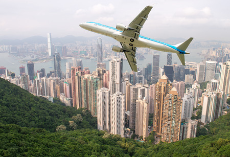 Airplane overflying Hong Kong.のeditorial素材
