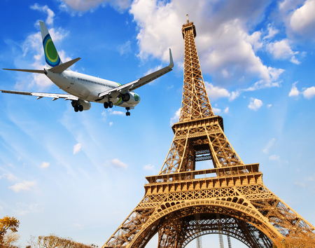 Airplane over Paris, France. Tourism and vacation concept.のeditorial素材