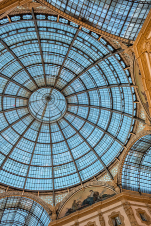 MILAN - SEPTEMBER 25, 2015: Walls of Galleria Vittorio Emanuele. Milan attracts 5 million people annually.のeditorial素材