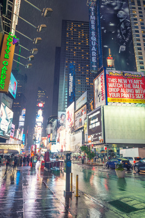 NEW YORK CITY - JUNE 13, 2013: Blurred view of tourists in Times Square. Times Square is a major commercial intersection and neighborhood in Midtown Manhattan.のeditorial素材