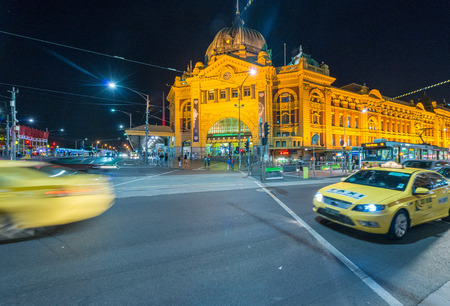 MELBOURNE AUSTRALIA - OCTOBER 10, 2015: Taxi in Melbourne downtown. Taxi is a key part of public transportation system in Melbourneのeditorial素材