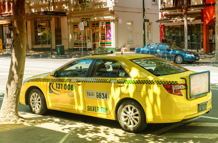 MELBOURNE, AUSTRALIA - OCTOBER 10, 2015: Yellow cabs in Melbourne, Australia. Taxis in Melbourne are regulated by the Taxi Services Commission which commenced that role on 1 July 2013のeditorial素材