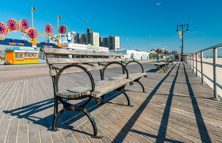 NEW YORK - OCTOBER 20: Coney Island boardwalk in front of the Wonder wheel on October 20, 2015 in Coney Island, NY. Coney Island is a famous tourist attraction.のeditorial素材
