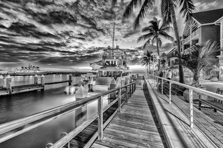KEY WEST, FLORIDA - JANUARY 12, 2016: Yacht anchored at night in city port. Key West is a famous tourist attraction in Florida.のeditorial素材