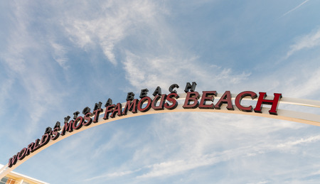 DAYTONA BEACH, FLORIDA - FEBRUARY 17, 2016: Daytona Beach sign. The popular spring break destination is dubbed "World's Most Famous Beach".のeditorial素材
