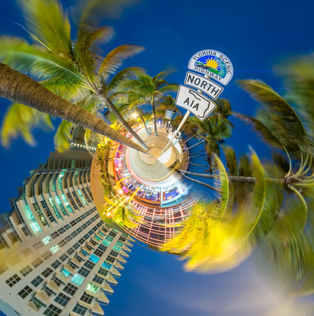 Planet Fort Lauderdale - Miniature planet of Fort Lauderdale at night, with modern buildings and...