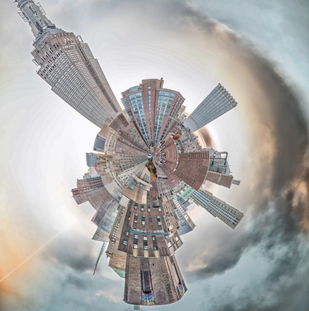 Planet Manhattan - Miniature planet of New York skyline at sunset.