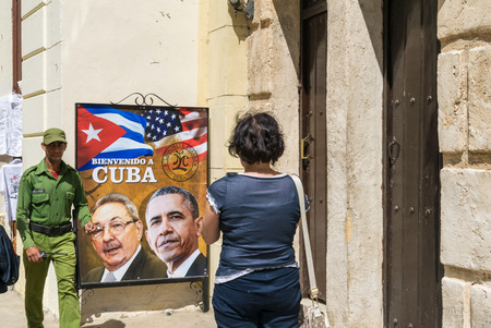 HAVANA, CUBA - APRIL 8, 2016: Poster on city street shows US President Obama historic visit to Havana, Cuba.のeditorial素材