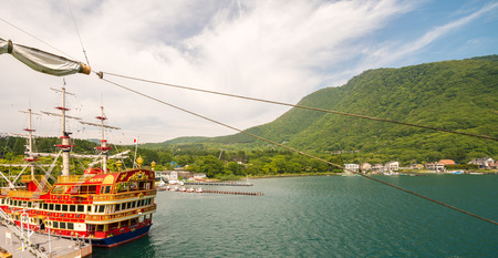 HAKONE, JAPAN - MAY 24, 2016:  The Hakone Sightseeing Cruise serves the 3 ports on Lake Ashi, a crater lake that lies along the southwest wall of the caldera of Mount Hakone.のeditorial素材