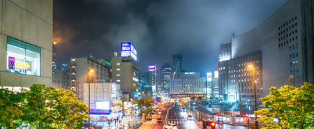 OSAKA, JAPAN - MAY 26, 2016: City skyline at night. Osaka attracts 5 million visitors every year.のeditorial素材