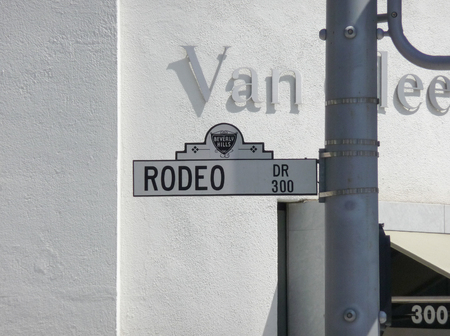 BEVERLY HILLS, CA - AUG 22: Rodeo Drive  street sign in Beverly Hills on August 22, 2014. Rodeo Drive is an affluent shopping district known for designer label and haute couture fashion.のeditorial素材