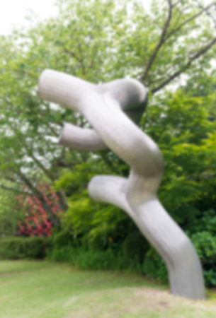 HAKONE, JAPAN - MAY 25, 2016: Blurred view of Hakone Open Air Museum on a cloudy day. It has collections of artworks made by Picasso, Henry Moore, Churyo Sato.のeditorial素材