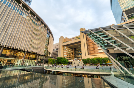 OSAKA, JAPAN - MAY 28, 2016: Tourists enjoy central station promenade. Osaka attracts 5 million people worldwide.のeditorial素材
