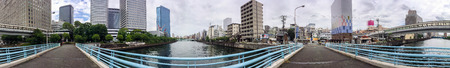 OSAKA, JAPAN - MAY 2016: Panoramic 360 degrees city view along the river. Osaka attracts 3 million visitors every year.のeditorial素材