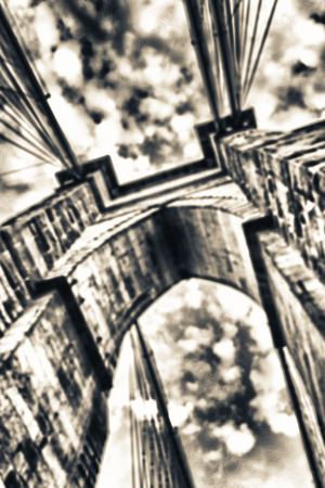 Blurred view of old Brooklyn Bridge pylons.の写真素材