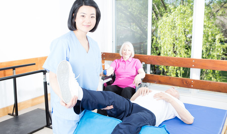 Happiness in elder rehab facility. Retired successful people.