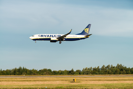 LONDON - SEPTEMBER 24, 2016: Ryanair flight lands in Stansted Airport. Ryanair is one of largest operators of Boeing 737 with fleet of 354 aircrafts.のeditorial素材