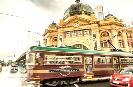 MELBOURNE - NOVEMBER 20, 2015: Blurred moving traffic in front of Flinders street station. Flinders Station is  an icon of Melbourne, Australia.のeditorial素材