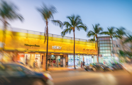 MIAMI BEACH - FEBRUARY 25, 2016: Beautiful sunset light in South Beach road. Miami attracts 15 million tourists annually.のeditorial素材