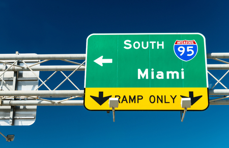 Miami interstate sign against blue sky.のeditorial素材