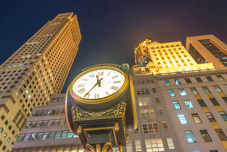 NEW YORK - OCTOBER 23, 2015. The Trump Tower on Fifth Avenue and its clock at night, typical of the high-end mixed use skyscrapers common in Manhattan which combine both commercial and residential use.のeditorial素材