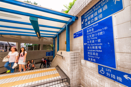 HONG KONG - APRIL 2014: MTR underground station in Hong Kong. Mass Transit Railway is rapid system in Hong Kong that is a common mode of public transport.のeditorial素材