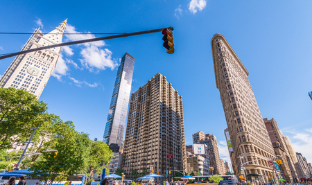 NEW YORK CITY - JUNE 2013: Flatiron building facade in Manhattan. Completed in 1902, it is...