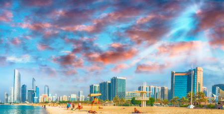 Abu Dhabi city view at sunset from Corniche Beach, UAE.の写真素材