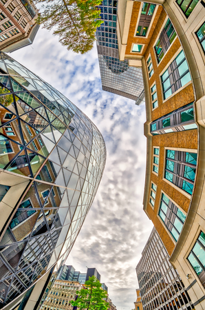 Modern and old buildings of London. Fisheye view from street level.のeditorial素材