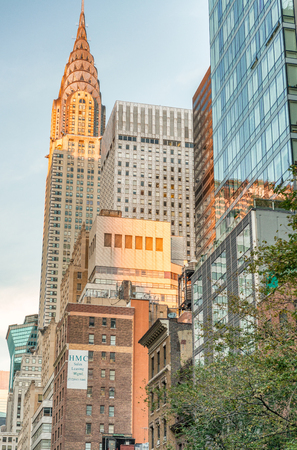NEW YORK CITY - SEPTEMBER 2015: Street view of Chrysler building. New York attracts 50 million people annually.のeditorial素材