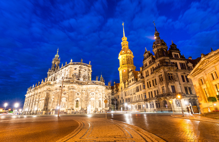 Hausmannsturm (Hausmann tower) of Residenzschloss (Royal Palace) and Katholische Hofkirche, Dresden, Saxony, Germany. Night panorama.のeditorial素材
