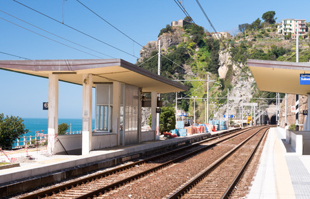CINQUE TERRE, ITALY - APRIL 7, 2013: Train along italian coast. The train is the best way to visit all Five Lands.のeditorial素材