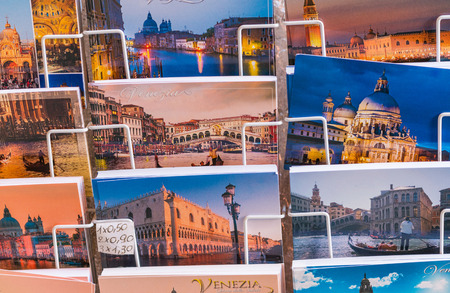 VENICE, ITALY - FEBRUARY 8, 2015: City greetings card in a shop. Venice is a famous destination in Italy.のeditorial素材