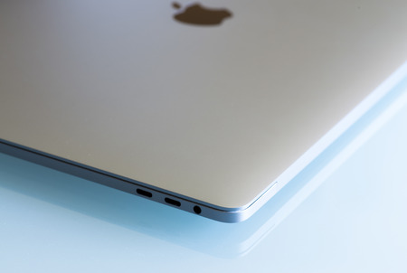 PISA, ITALY - DECEMBER 2016: Macbook Pro 15 inches with touchbar. The fourth generation MacBook Pro was announced on October 27, 2016.のeditorial素材