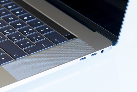 PISA, ITALY - DECEMBER 2016: Macbook Pro 15 inches with touchbar. The fourth generation MacBook Pro was announced on October 27, 2016.のeditorial素材