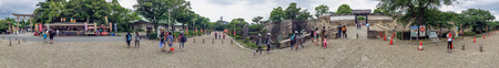 OSAKA - MAY 26, 2016: Tourists in Osaka Castle Park. Osaka is a major attraction in Japan.