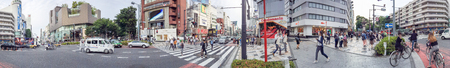 TOKYO - MAY 20, 2016: Tourists in Shibuya. Tokyo attracts 5 million foreign visitors each year.