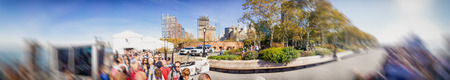 NEW YORK CITY - OCTOBER 2015: Tourists in line for Liberty Island Ferry. New York attracts 50 million tourists annually.のeditorial素材